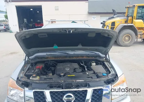 2010 Nissan Titan Se z USA, uszkodzony, nr VIN 1N6AA0EC7AN321572